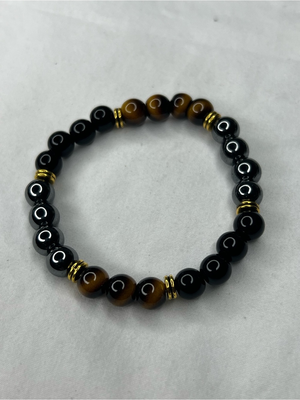 Black zinc and Brown Tiger eye Beaded Bracelet with Gold Accents